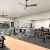 Large fitness center with cardio and weight lifting equipment.